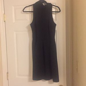 Sleeveless, turtleneck little black dress